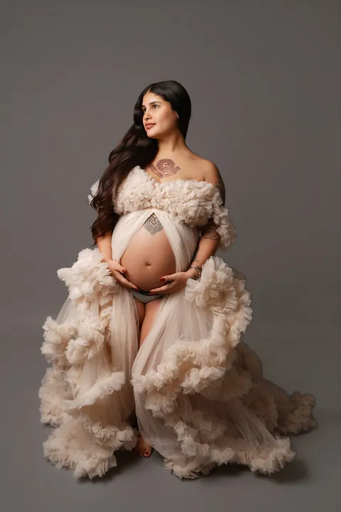 Vestido marfil de tul con volantes